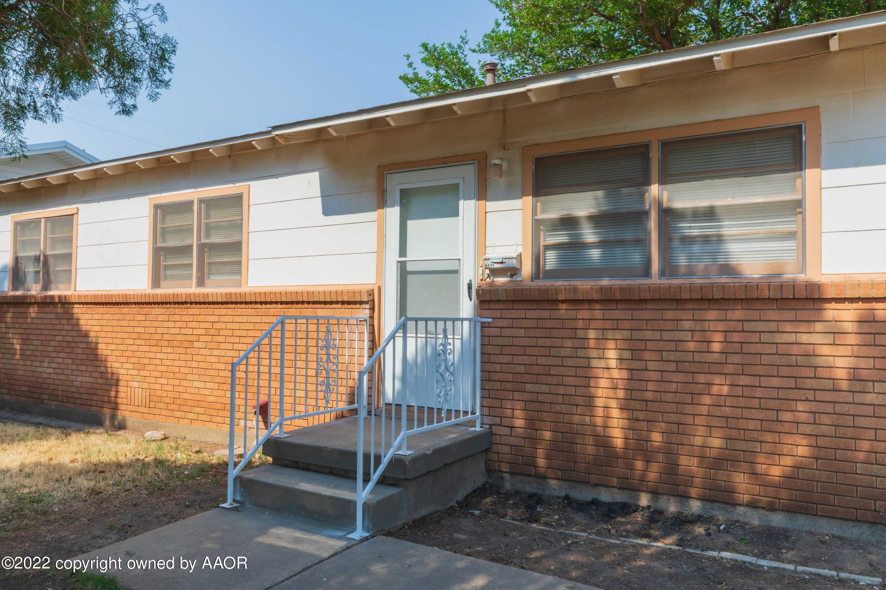 5138 Crockett Street Amarillo, TX 79110 - Photo 2 of 35 a view of a house with a window