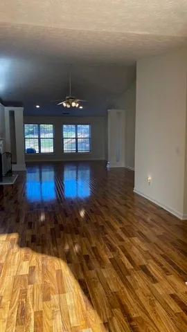 a view of entryway with wooden floor