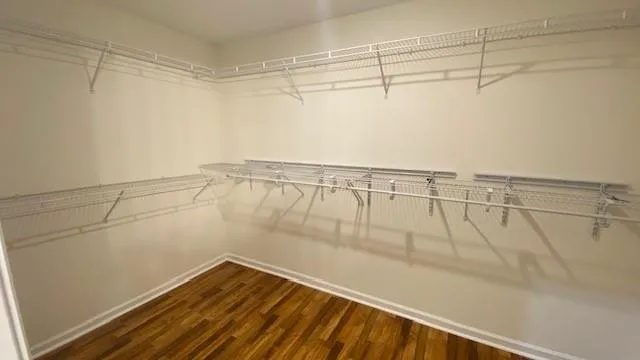 a bathroom with a double vanity sink and mirror