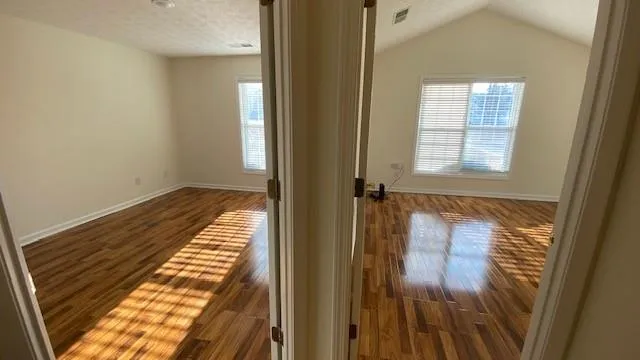 an empty room with windows