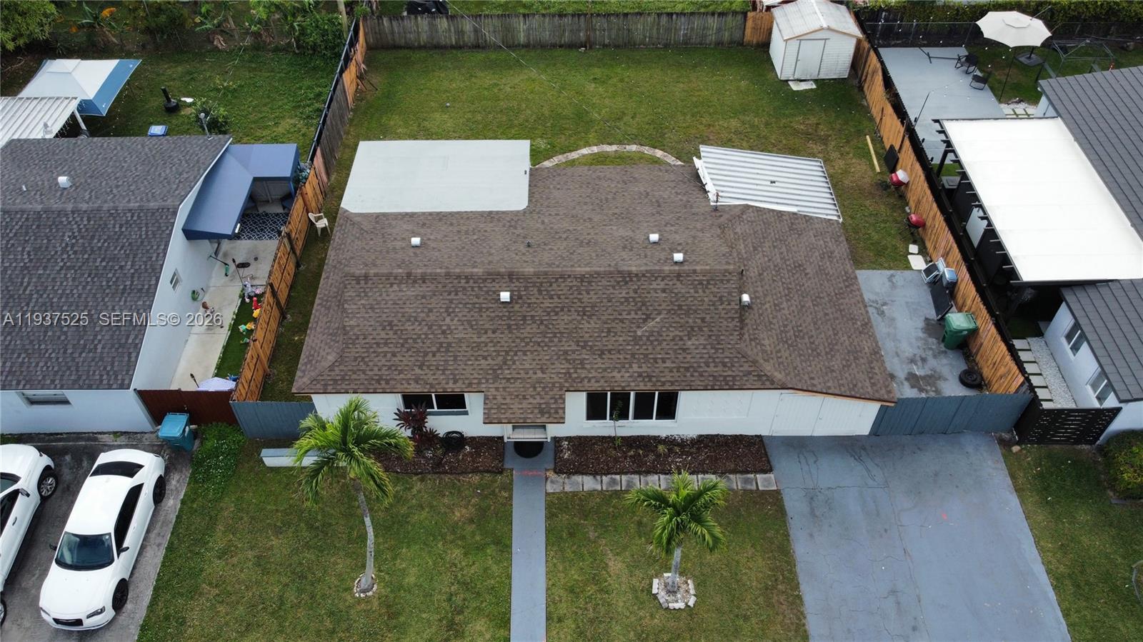 11962 Southwest 37th Terrace Miami, FL 33175 - Photo 2 of 24 an aerial view of a house with a garden