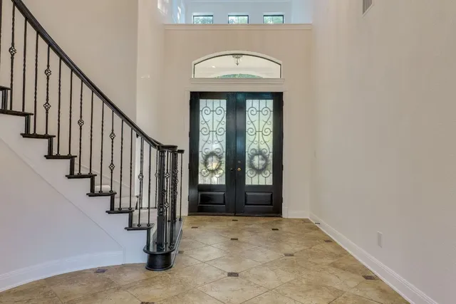 a view of entryway with wooden floor