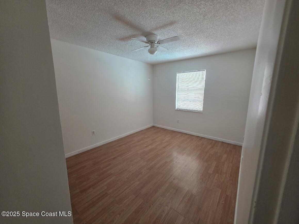 250 Perth Avenue Merritt Island, FL 32953 - Photo 18 of 48 an empty room with a window