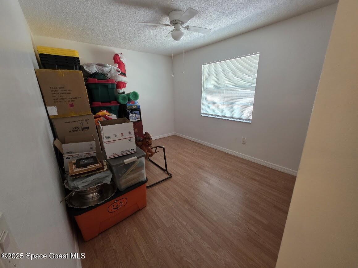250 Perth Avenue Merritt Island, FL 32953 - Photo 20 of 48 a view of workspace with wooden floor