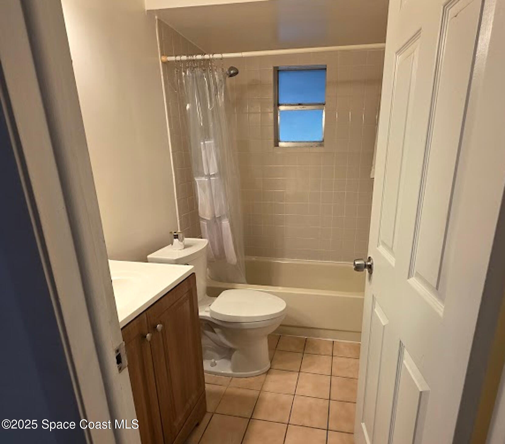 250 Perth Avenue Merritt Island, FL 32953 - Photo 28 of 48 a bathroom with a sink and a toilet