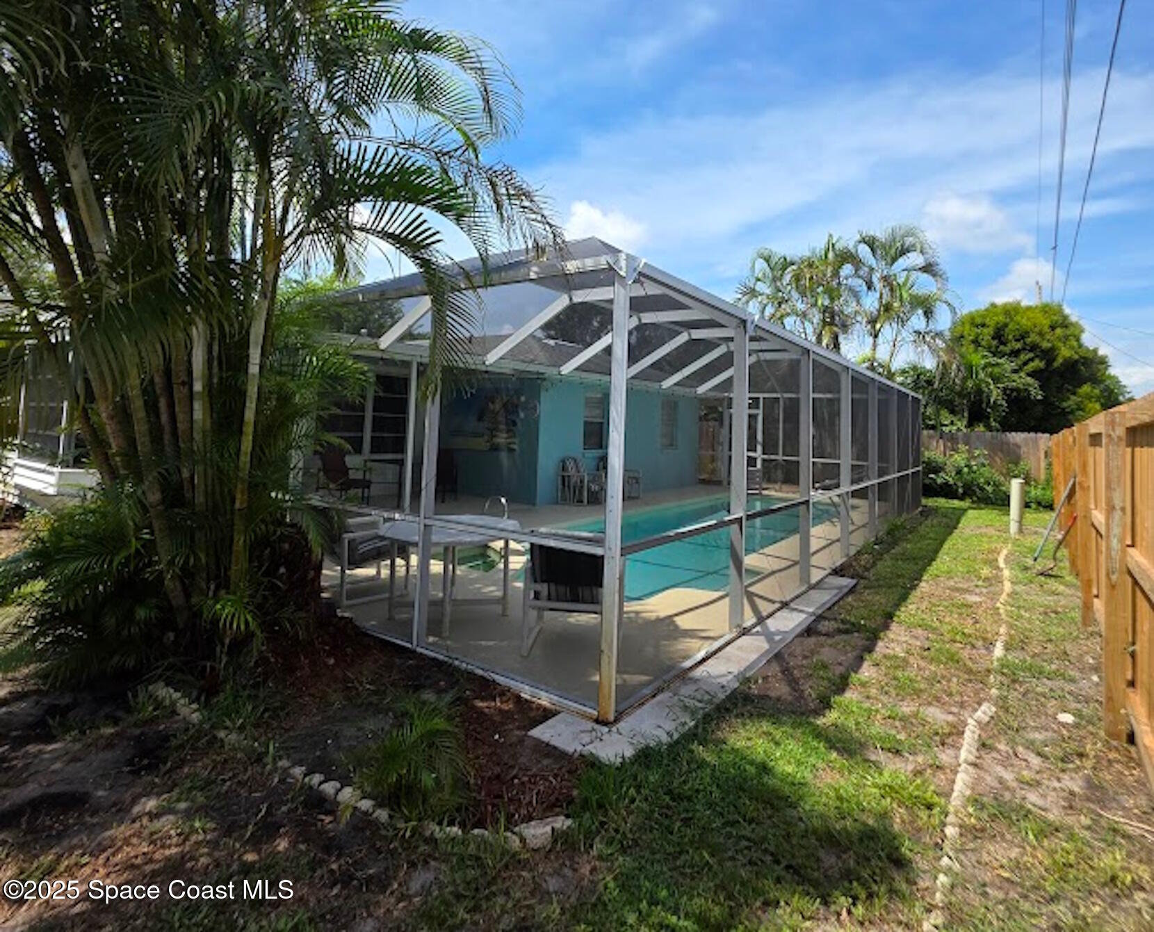 250 Perth Avenue Merritt Island, FL 32953 - Photo 39 of 48 a view of a house with backyard and sitting area