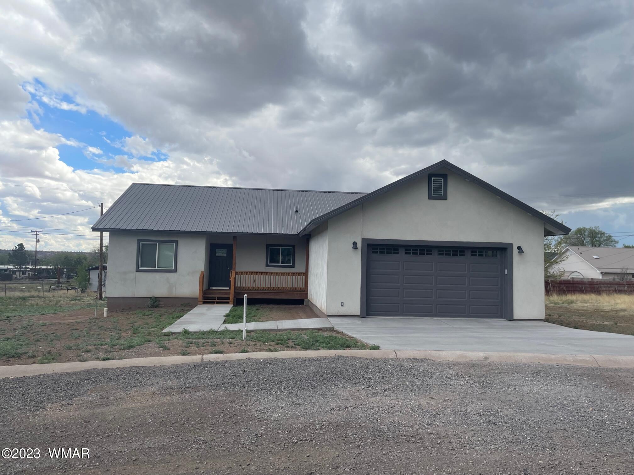 442 Susie Lane Springerville, AZ 85938 - Photo 1 of 46 a house with yard in front of it