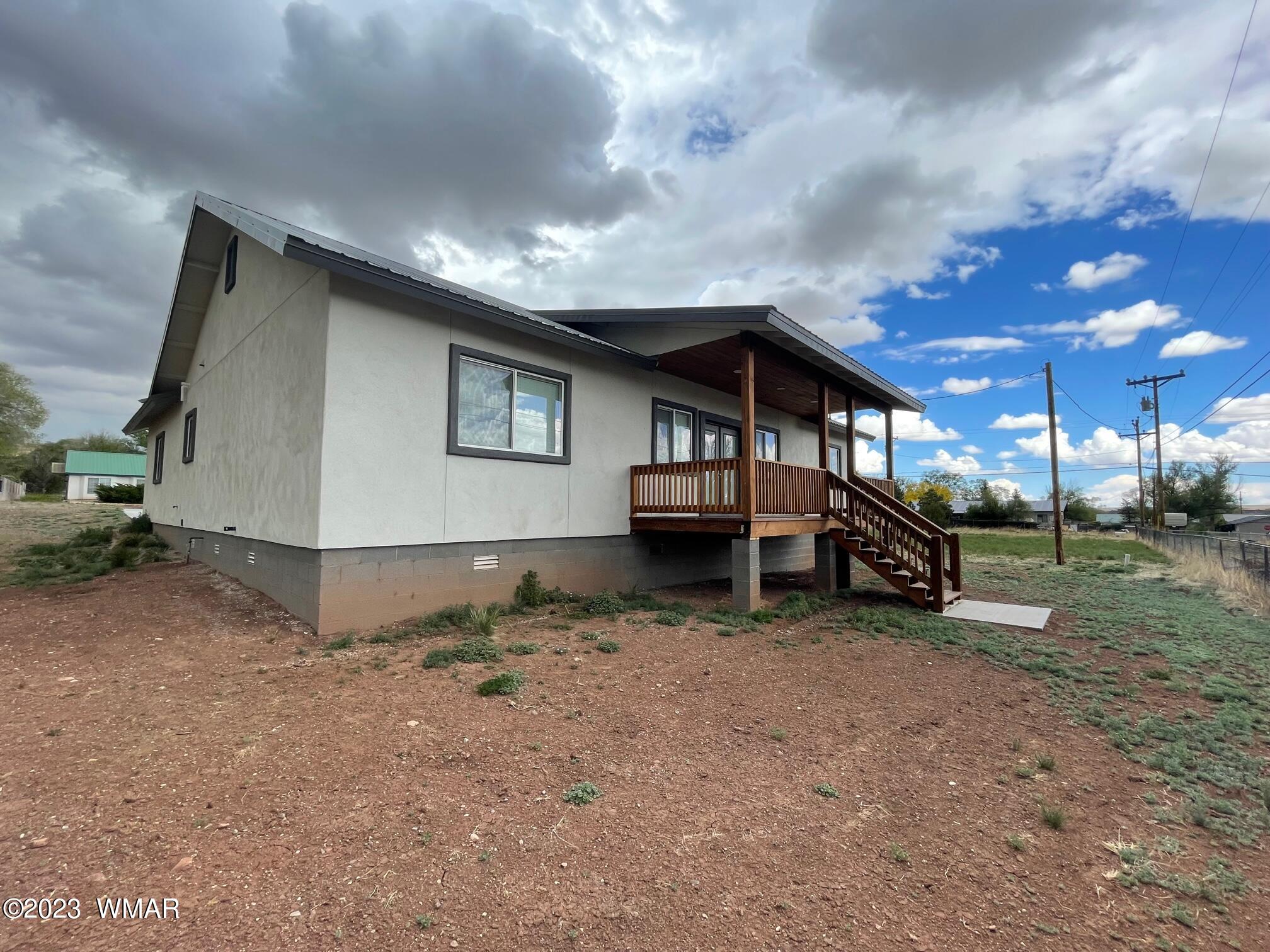 442 Susie Lane Springerville, AZ 85938 - Photo 45 of 46 a view of a house with a yard and sitting area