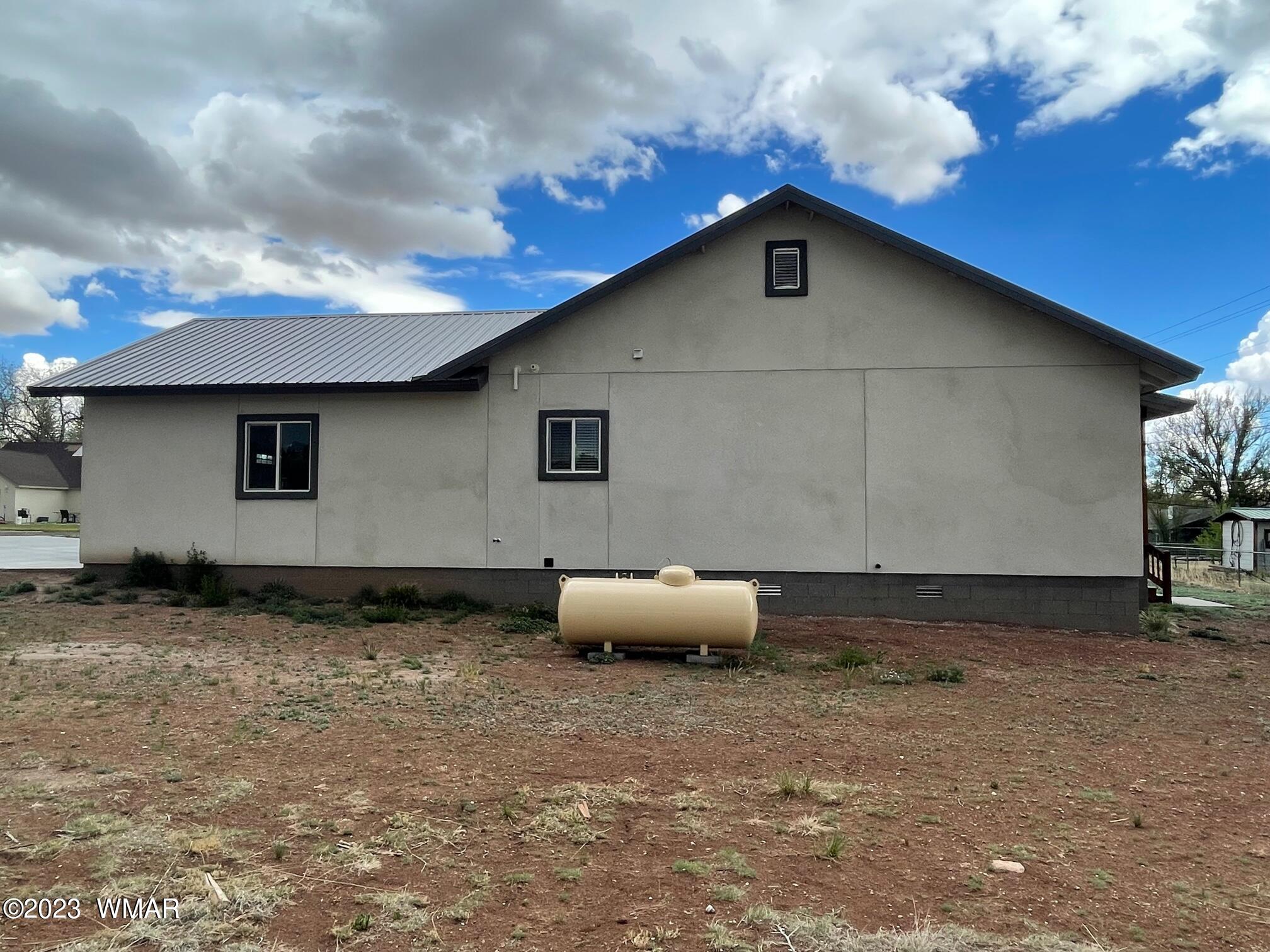 442 Susie Lane Springerville, AZ 85938 - Photo 46 of 46 a front view of a house with garden