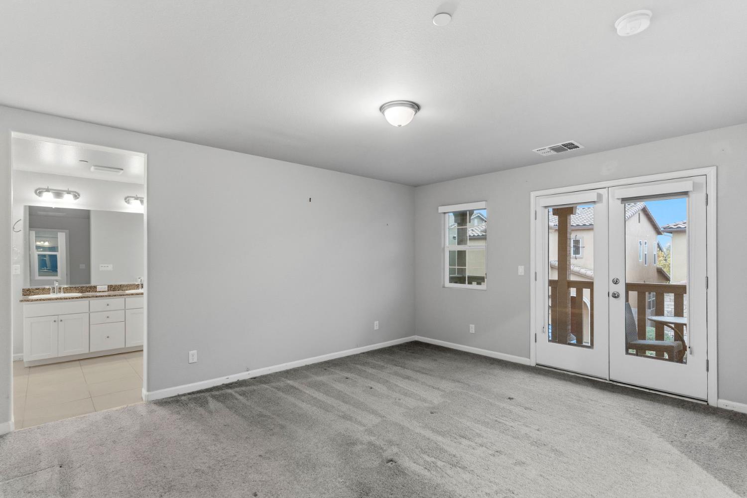 859 Lassen Lane West Madera, CA 93636 - Photo 12 of 19 a view of an empty room with a window