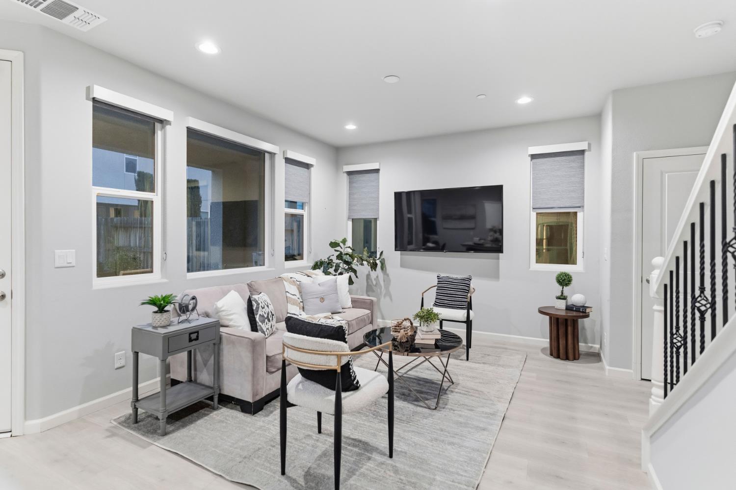 859 Lassen Lane West Madera, CA 93636 - Photo 7 of 19 a living room with furniture and a flat screen tv
