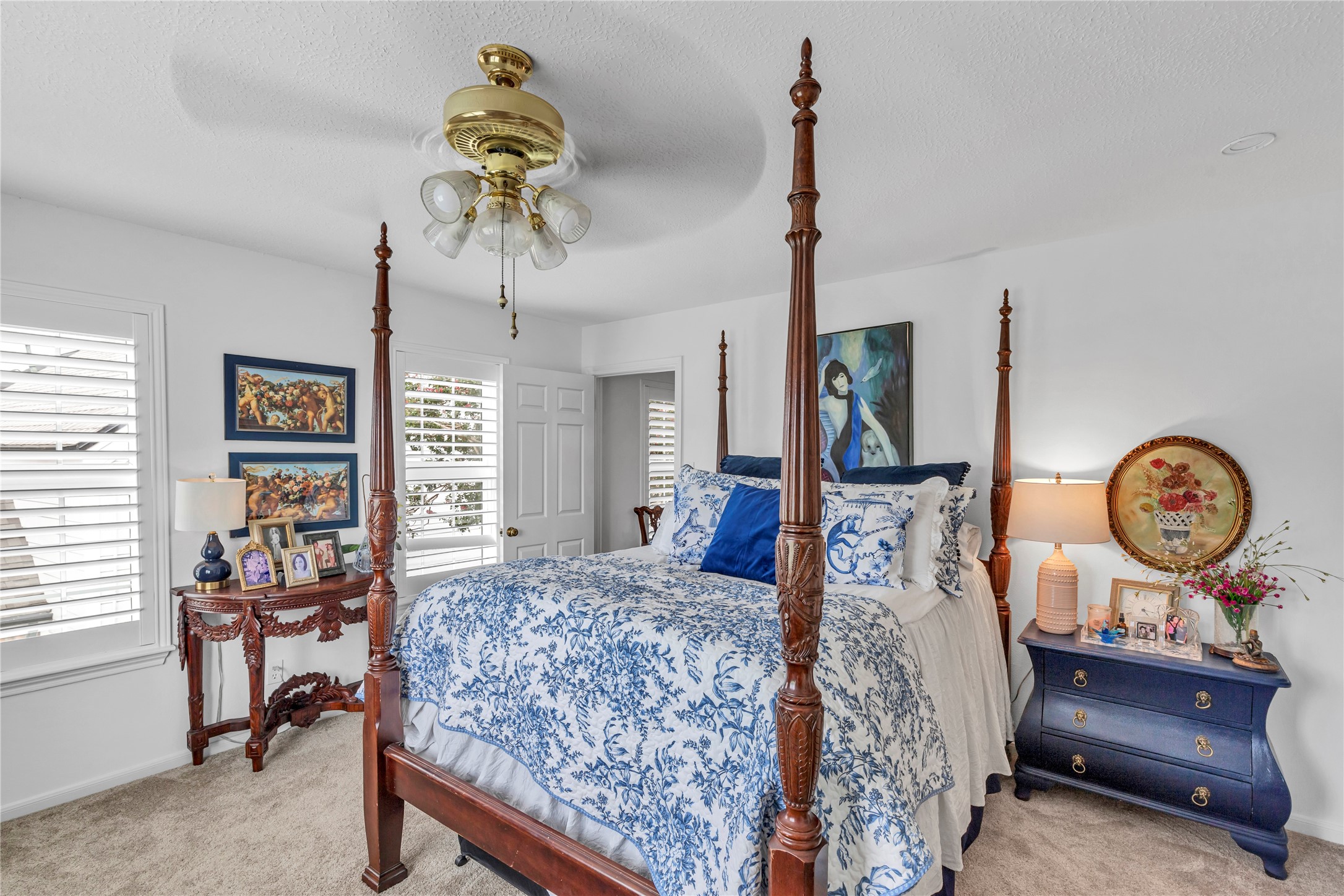 7631 Ameswood Road Houston, TX 77095 - Photo 27 of 33 a bed room with a bed mirror and a window