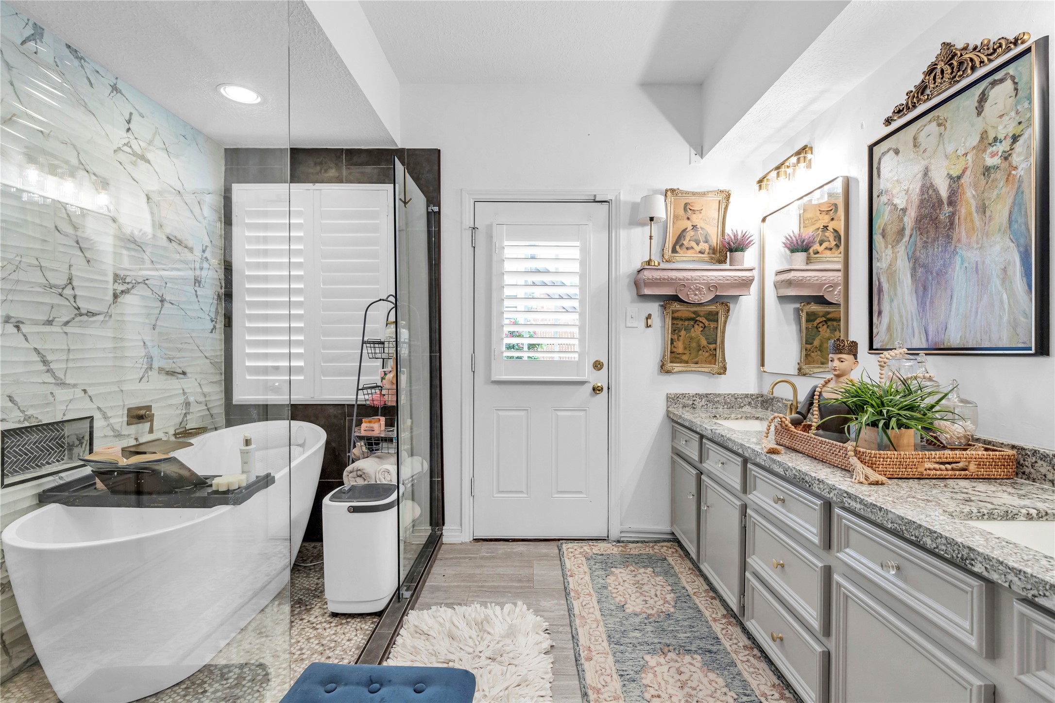 7631 Ameswood Road Houston, TX 77095 - Photo 10 of 33 a bathroom with a granite countertop tub sink and mirror