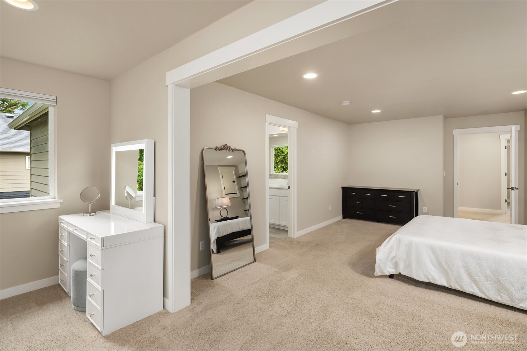 1435 242nd Place Southeast Bothell, WA 98021 - Photo 27 of 40 a bedroom with a bed and a cabinets