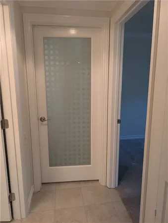 a bathroom with a granite countertop sink a mirror and shower