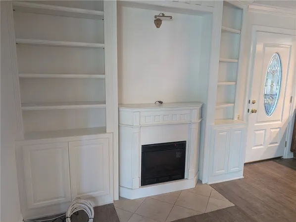 a living room with a fireplace