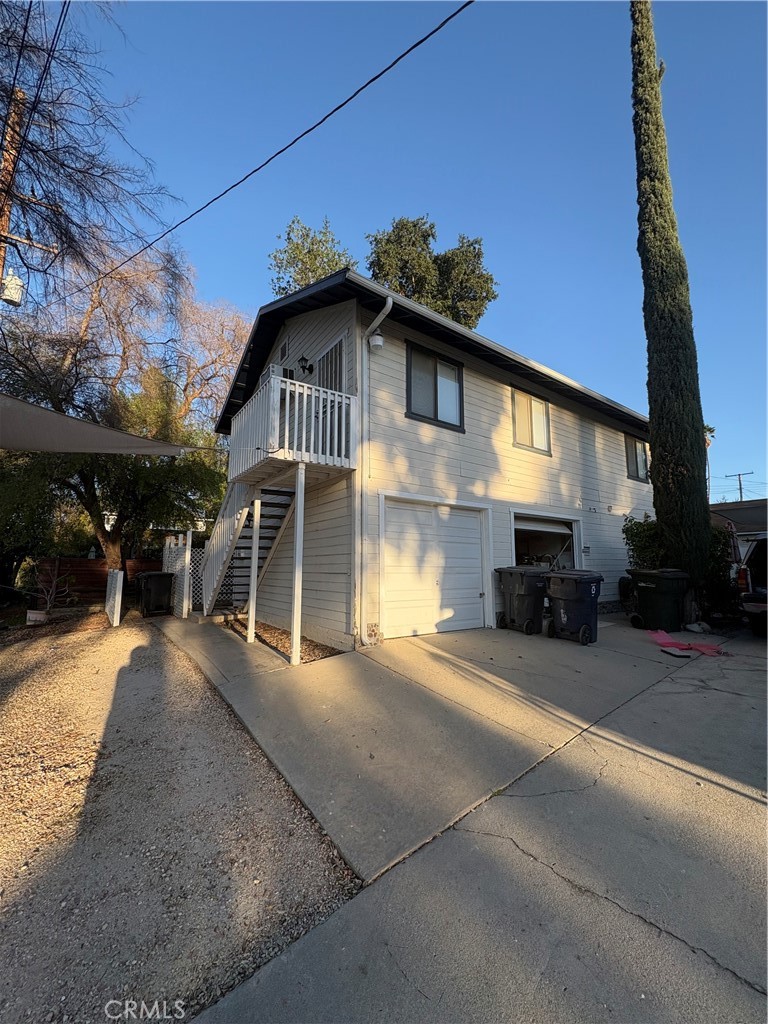 531 West Clark Street Redlands, CA 92373 - Photo 2 of 6 a front view of a house with a yard