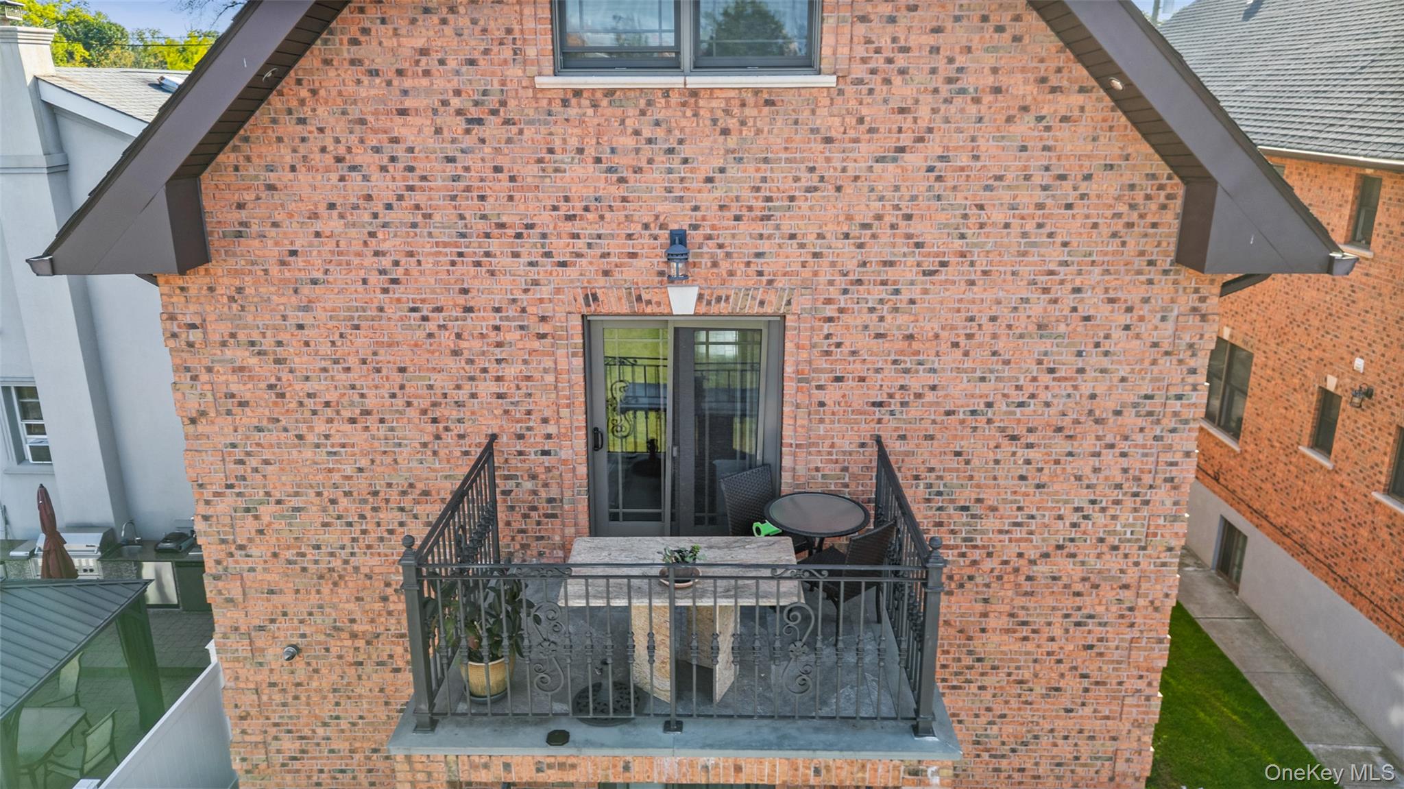 2063 Narragansett Avenue, Unit 2 Bronx, NY 10461 - Photo 33 of 37 Rear view of property featuring brick siding