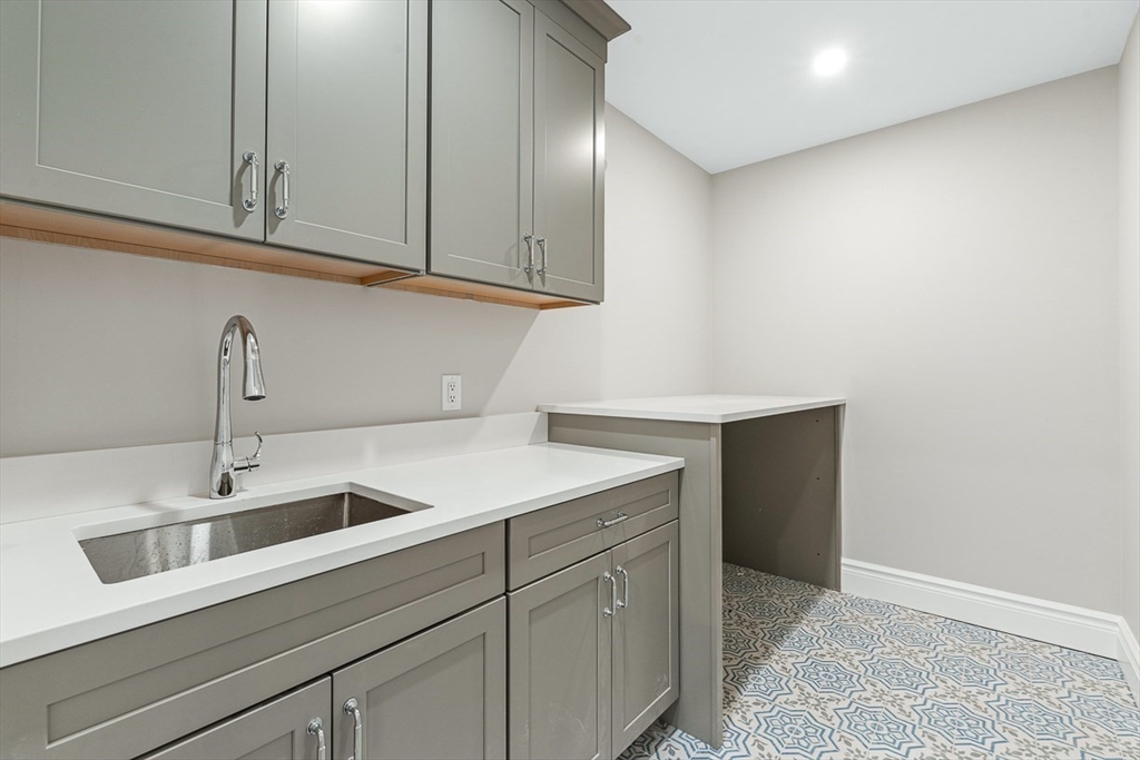 7 Crossman Road Woburn, MA 01801 - Photo 23 of 42 a kitchen with a sink and cabinets