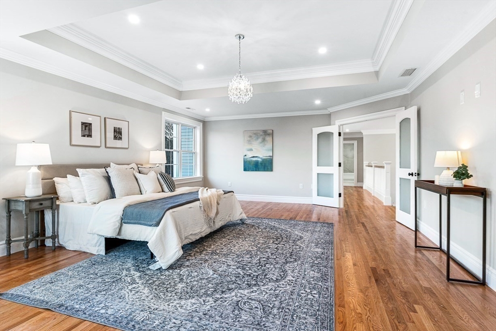 7 Crossman Road Woburn, MA 01801 - Photo 27 of 42 a bed room with furniture and a rug