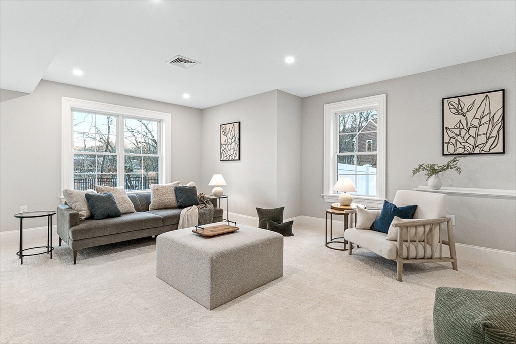 7 Crossman Road Woburn, MA 01801 - Photo 31 of 42 a living room with furniture and a window