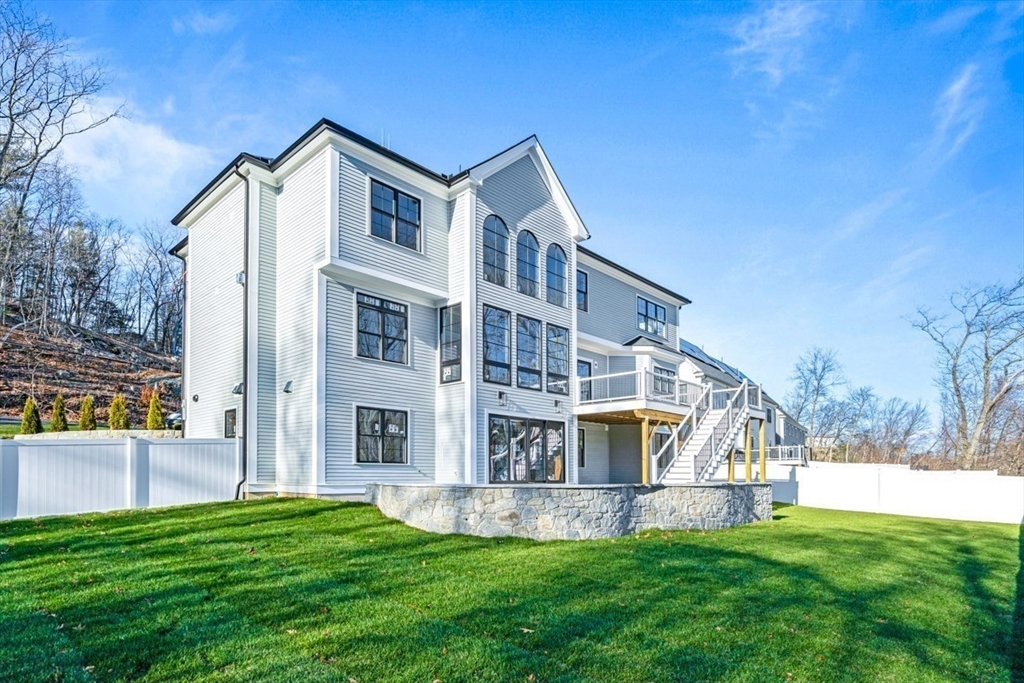 7 Crossman Road Woburn, MA 01801 - Photo 39 of 42 a view of house with a yard