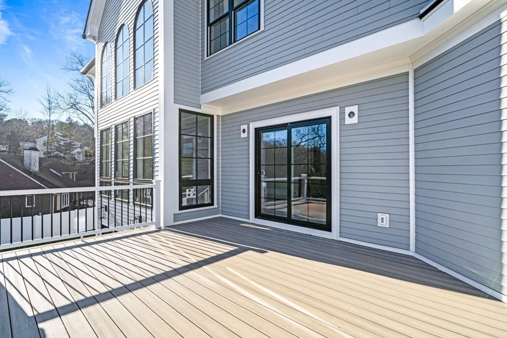 7 Crossman Road Woburn, MA 01801 - Photo 41 of 42 a view of a house with a large window