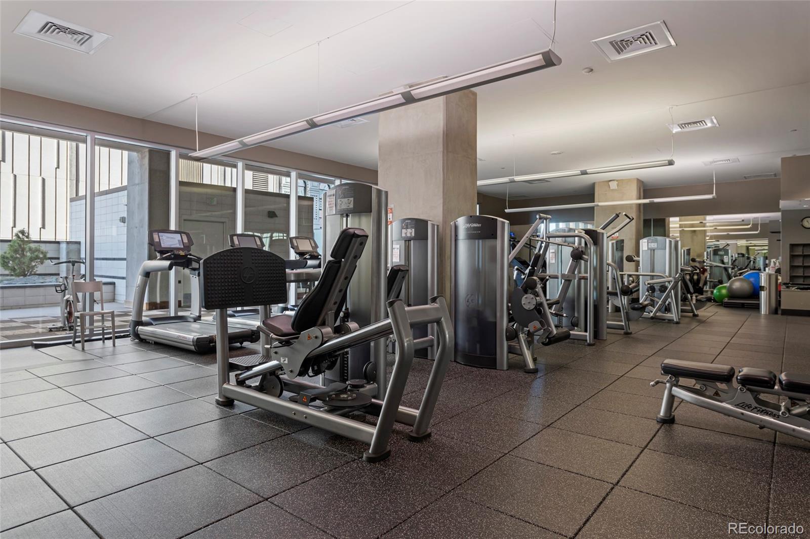 891 14th Street, Unit 1916 Denver, CO 80202 - Photo 30 of 33 a view of a room with gym equipment