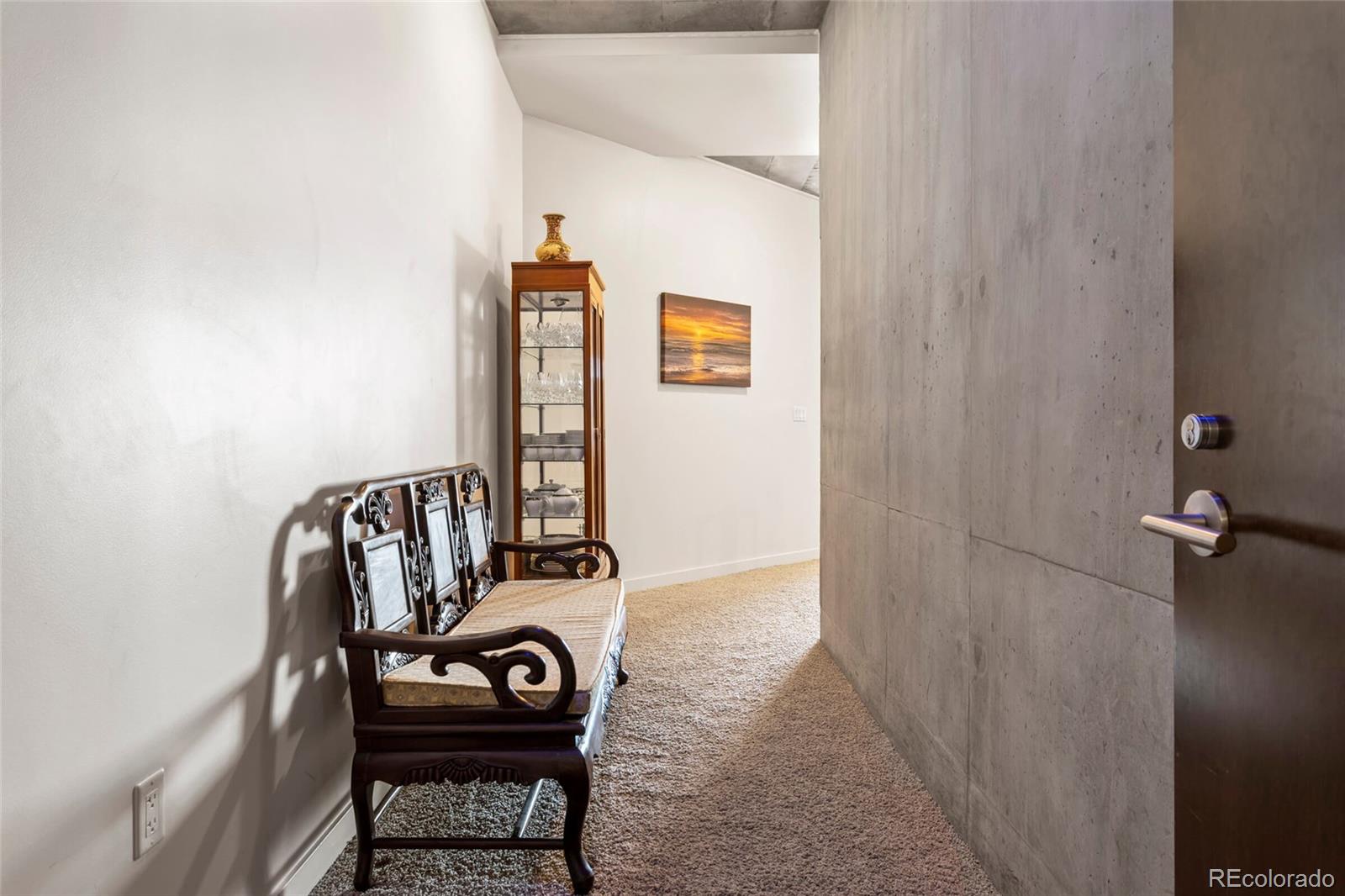 891 14th Street, Unit 1916 Denver, CO 80202 - Photo 3 of 33 a view of a hallway with front door