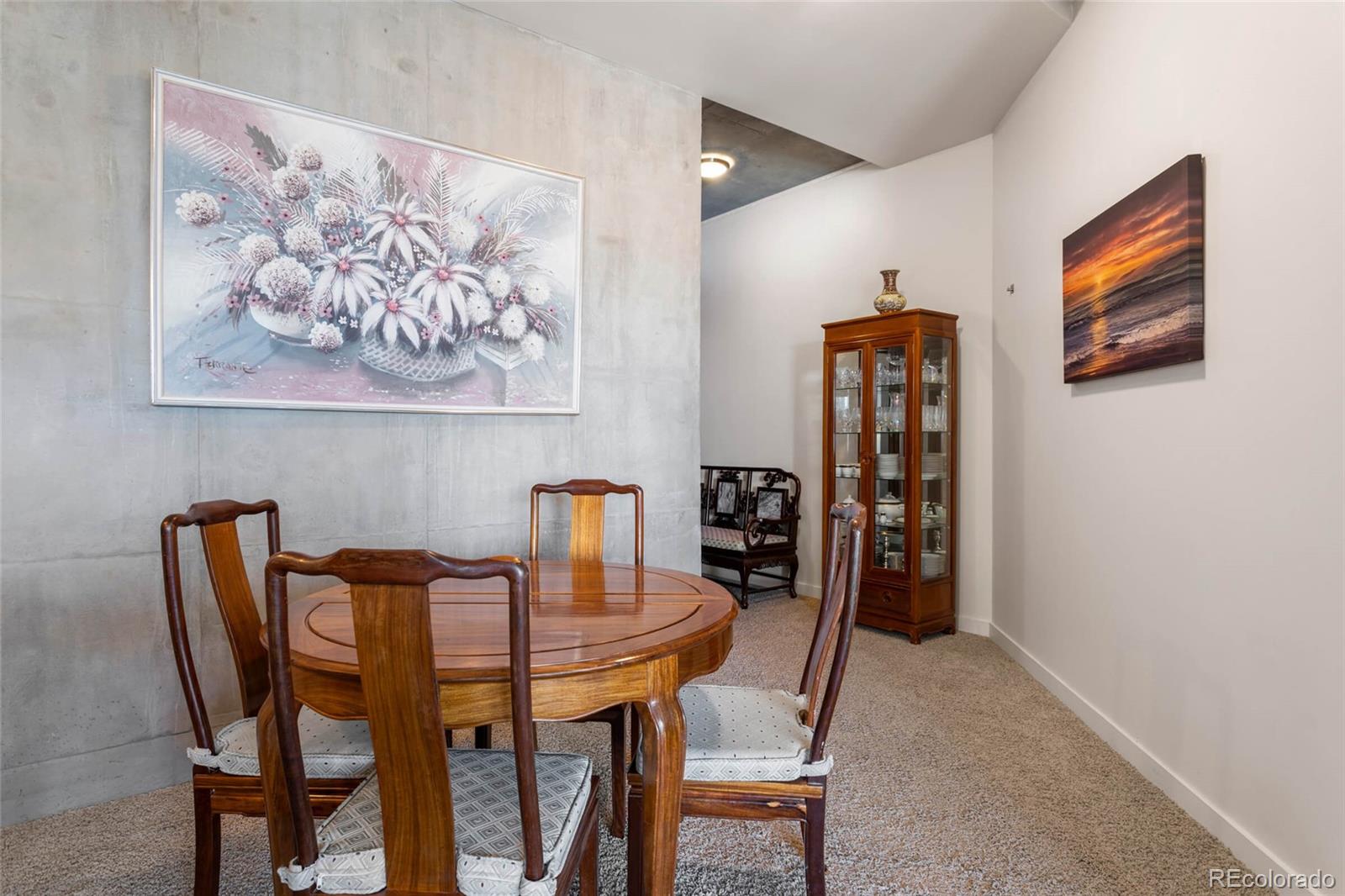 891 14th Street, Unit 1916 Denver, CO 80202 - Photo 4 of 33 a dining room with furniture and wooden floor