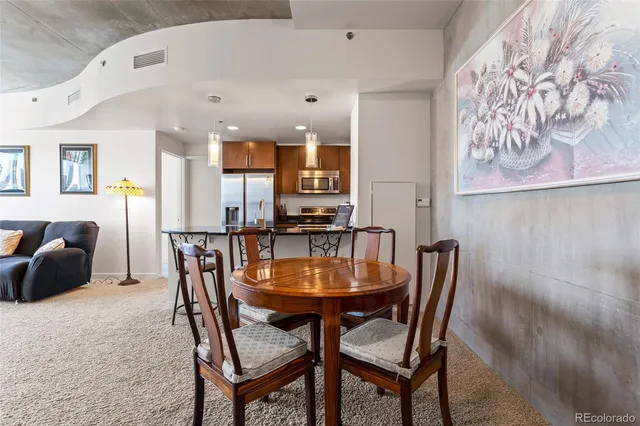 a view of a dining room with furniture