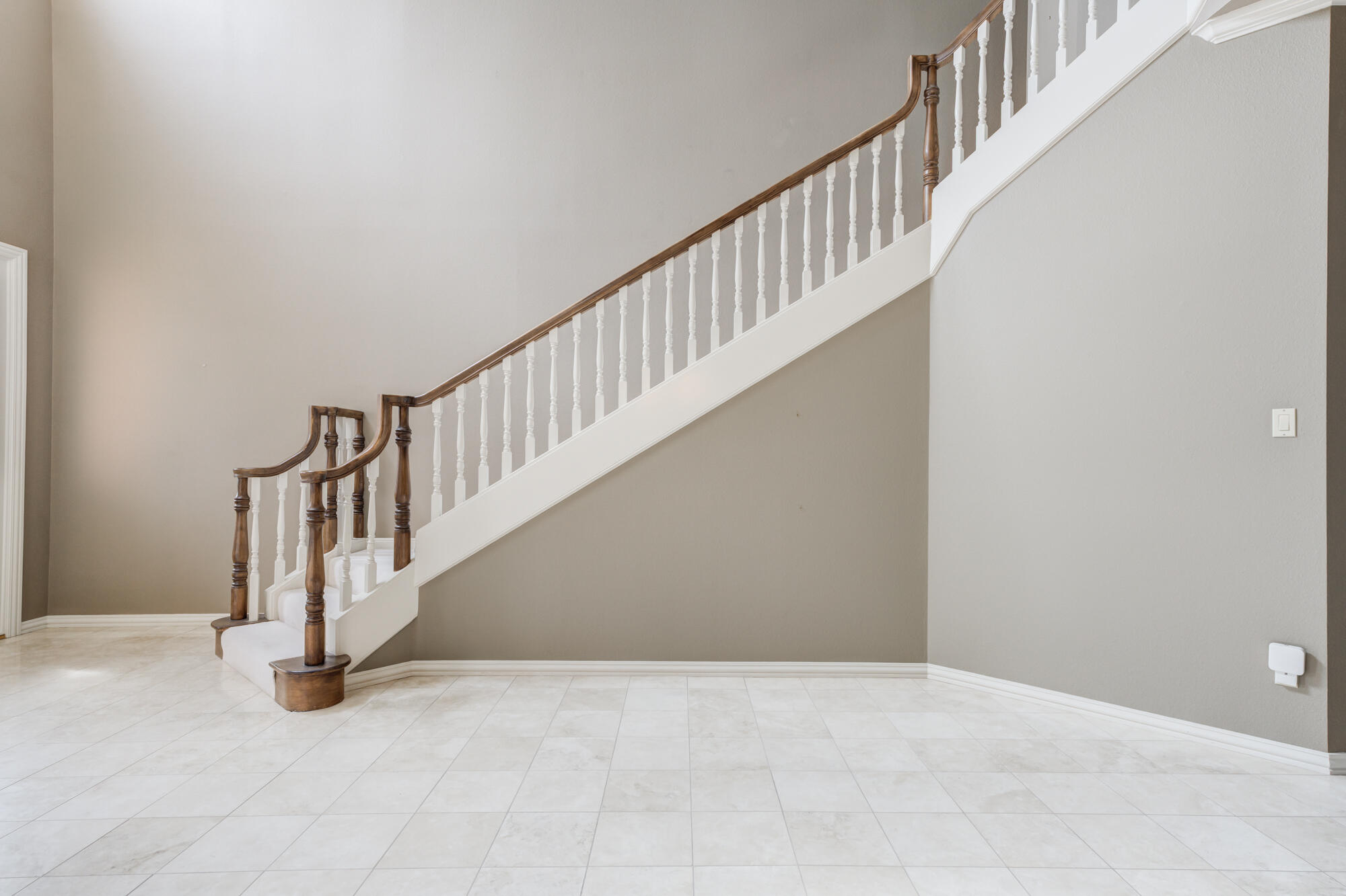 8902 York Place Lubbock, TX 79424 - Photo 14 of 54 a view of staircase with railing and white walls