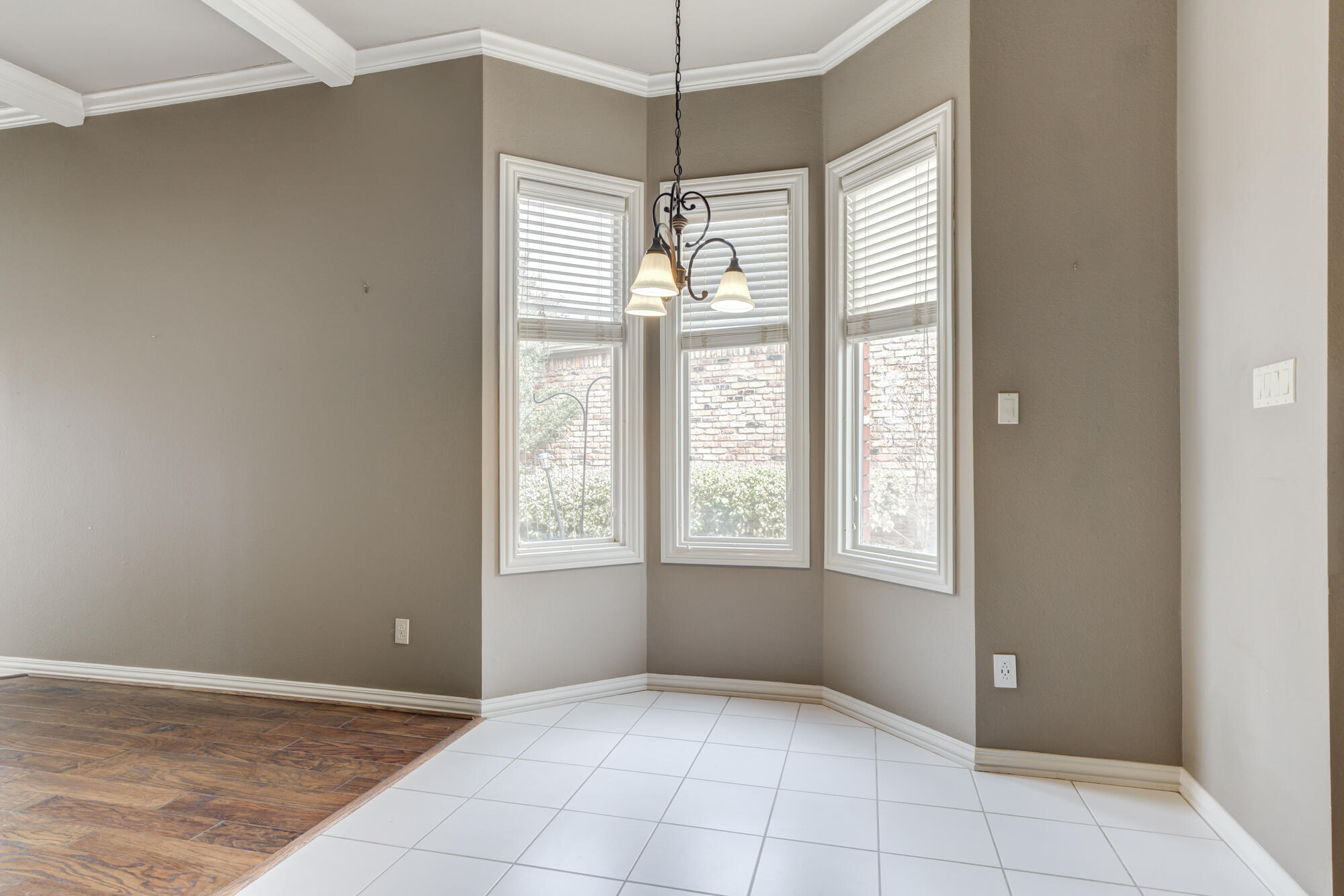 8902 York Place Lubbock, TX 79424 - Photo 19 of 54 a view of an empty room with a window