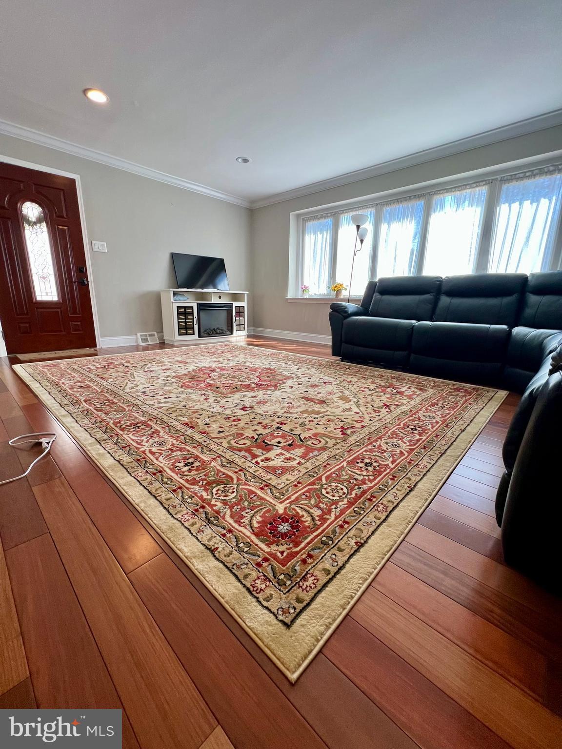 2988 Welsh Road Philadelphia, PA 19152 - Photo 8 of 38 a living room with a rug and a couch
