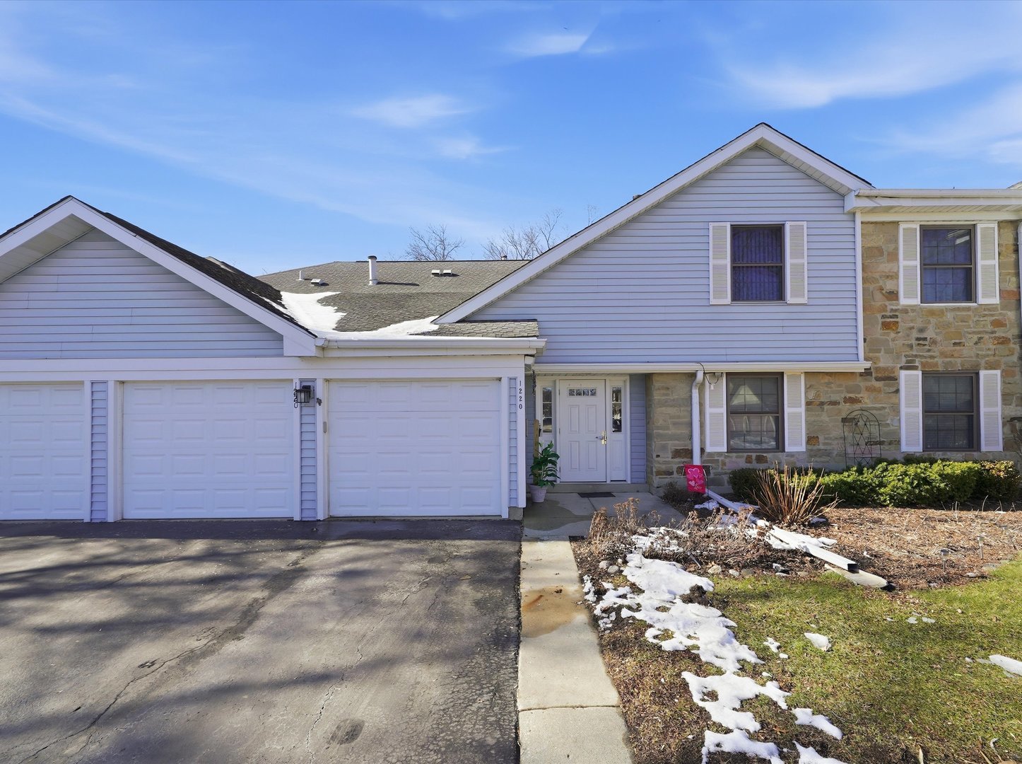 a front view of house with an outdoor space