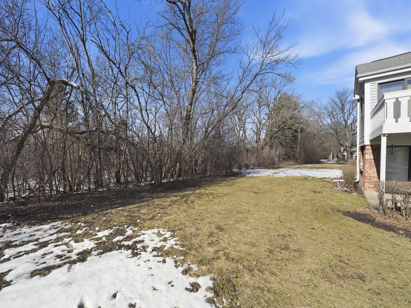 1220 Plum Tree Court, Unit 2D Schaumburg, IL 60193 - Photo 19 of 24 a view of a yard with a house