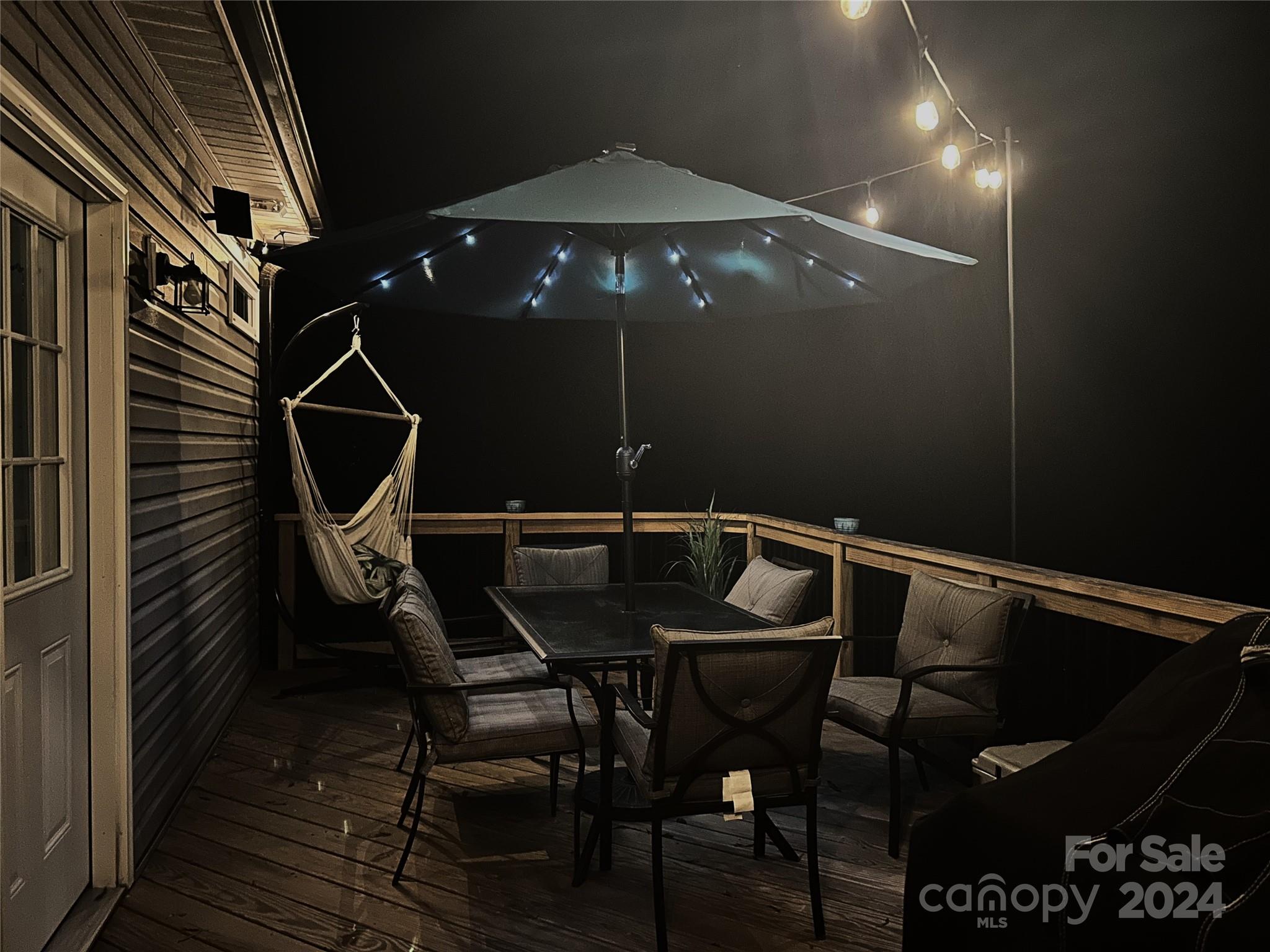 11111 Graybark Road Midland, NC 28107 - Photo 26 of 37 a patio with table and chairs