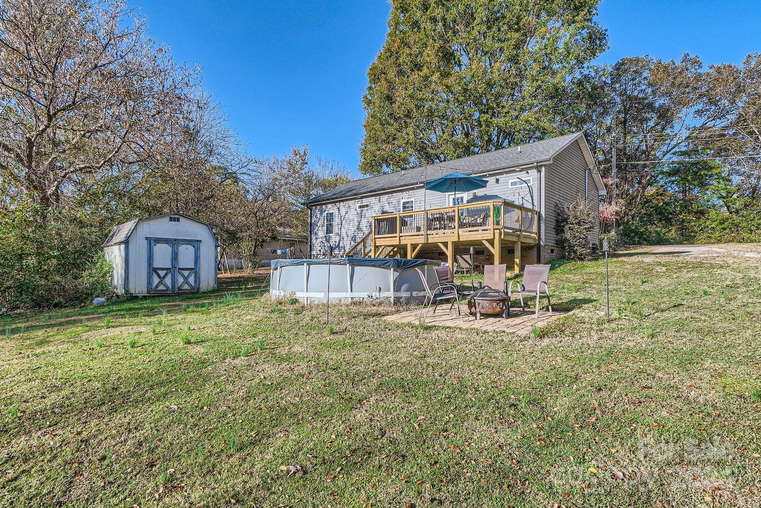 11111 Graybark Road Midland, NC 28107 - Photo 27 of 37 a view of a house with a yard and sitting area