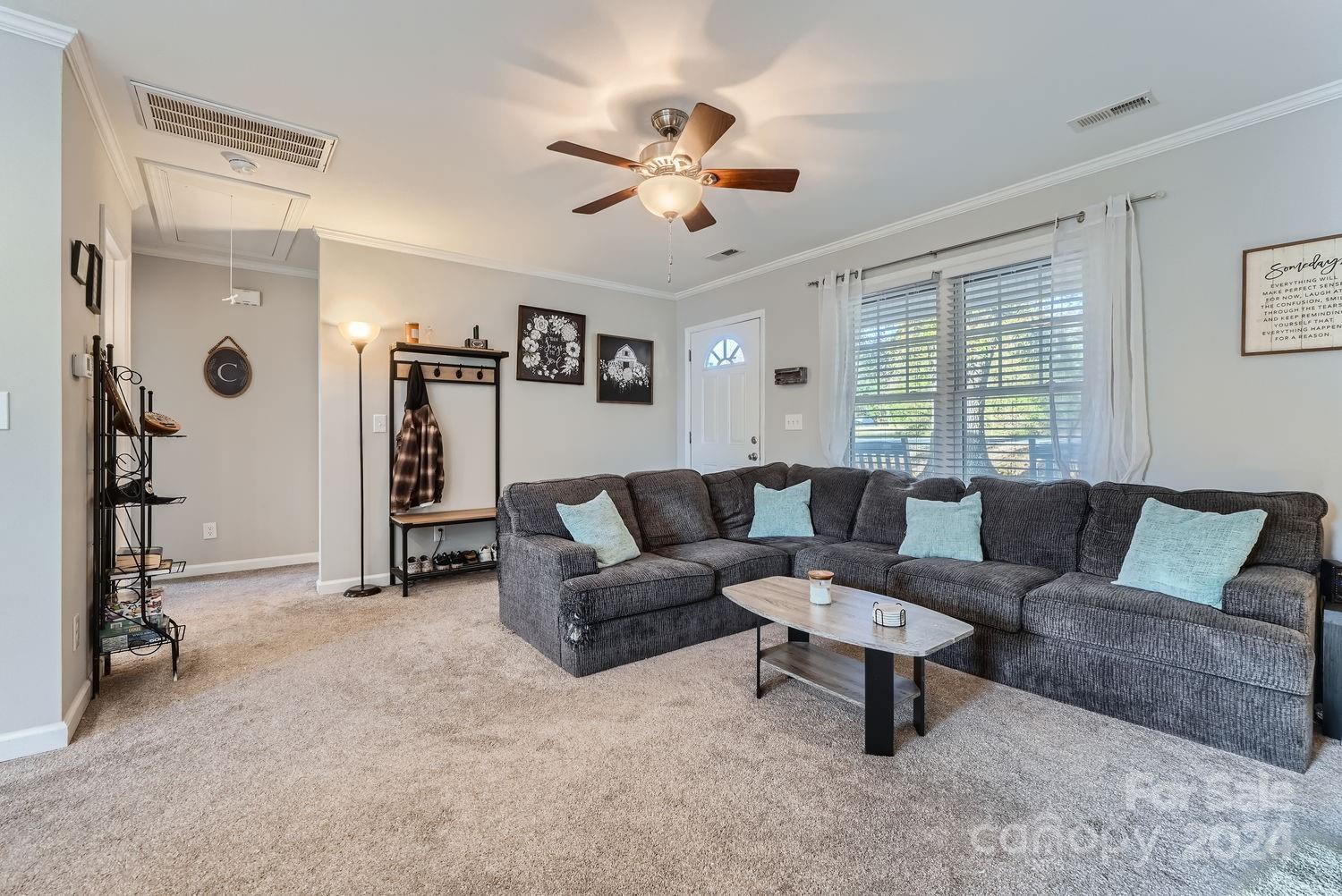 11111 Graybark Road Midland, NC 28107 - Photo 7 of 37 a living room with furniture and a large window