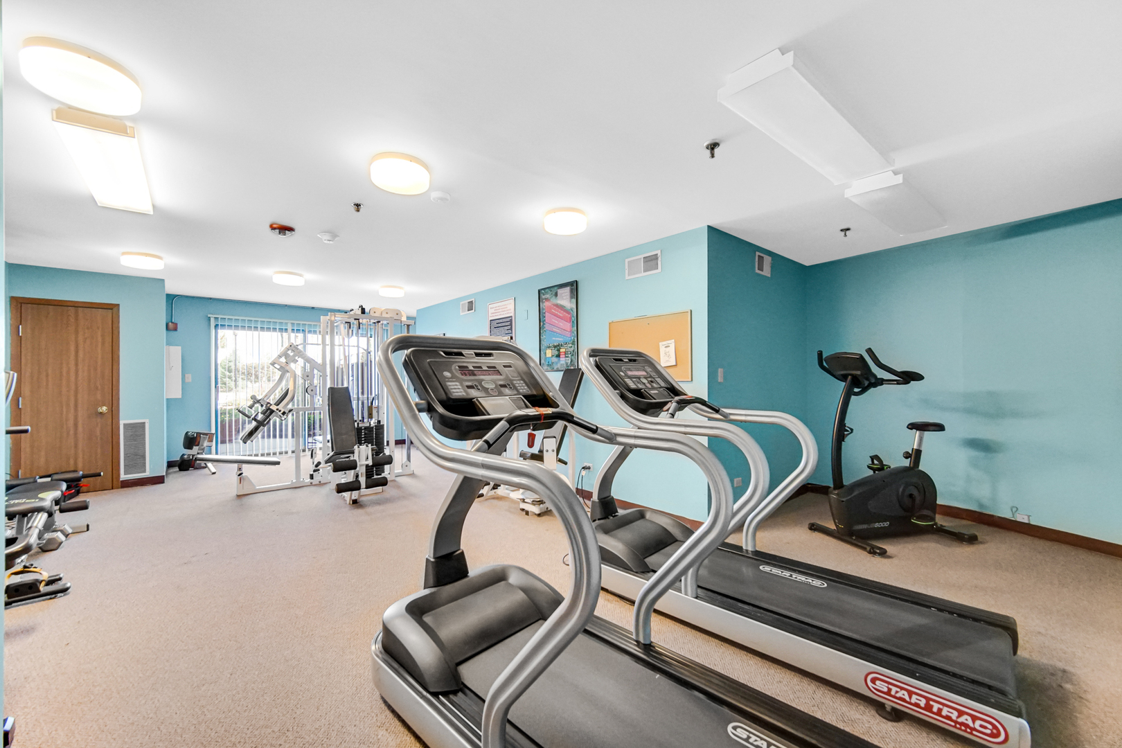 3255 Kirchoff Road, Unit 312 Rolling Meadows, IL 60008 - Photo 19 of 22 a room with gym equipment
