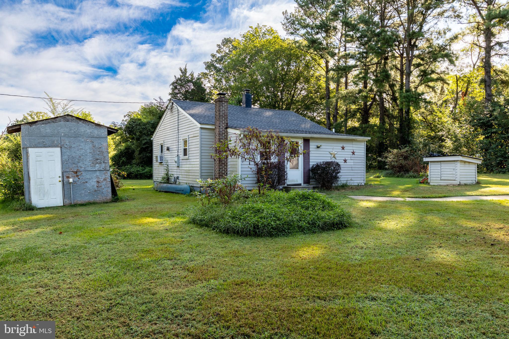 17227 Oakshade Road Orange, VA 22960 - Photo 1 of 19 a front view of house with yard and green space