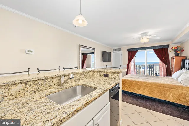 a view of a balcony with wooden floor and stairs