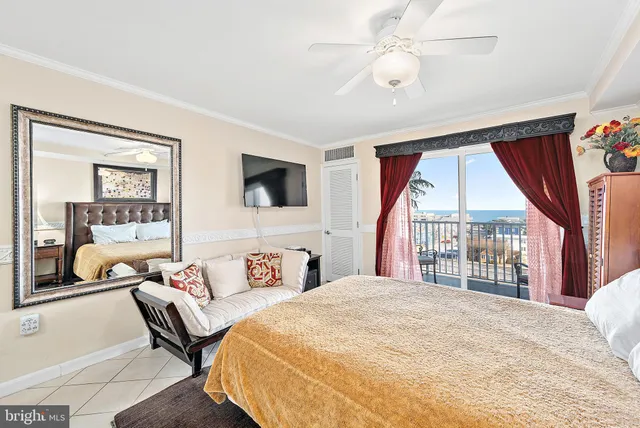 a view of living room with furniture and wooden floor