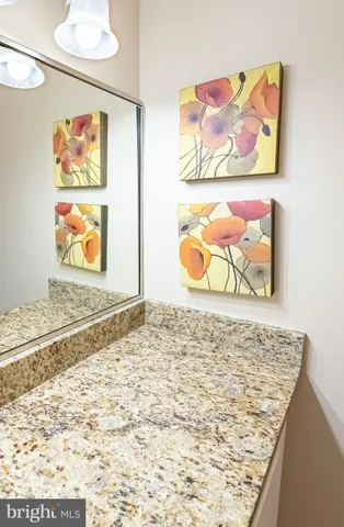 a view of a balcony with a floor to ceiling window and wooden fence