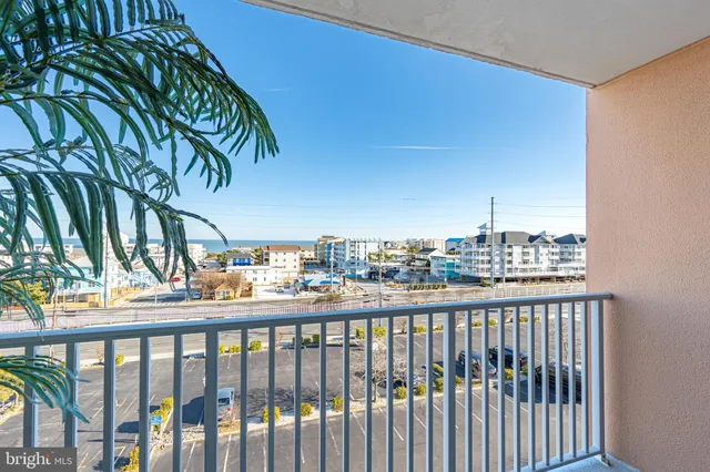 a outdoor space with patio furniture and a potted plant