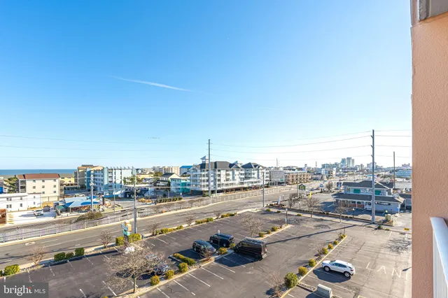 a dining hall with lots of tables and chairs