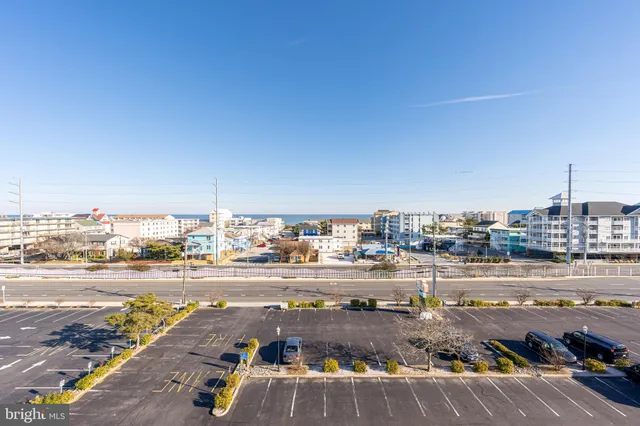 a view of a living room and entry way