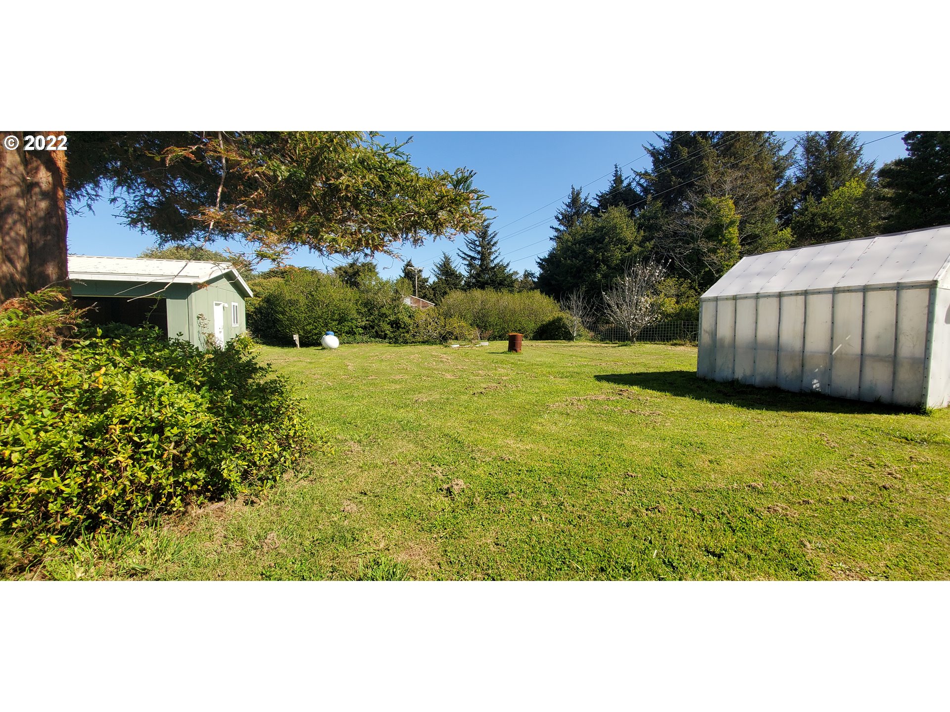 94635 Grange Road Gold Beach, OR 97444 - Photo 3 of 27 a view of an outdoor space and a lake view