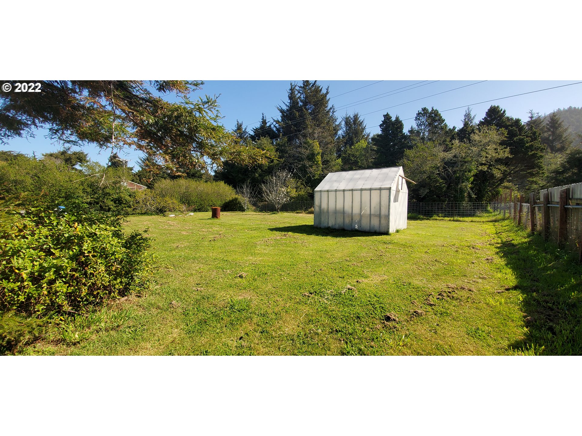 94635 Grange Road Gold Beach, OR 97444 - Photo 4 of 27 a view of an outdoor space and mountain view
