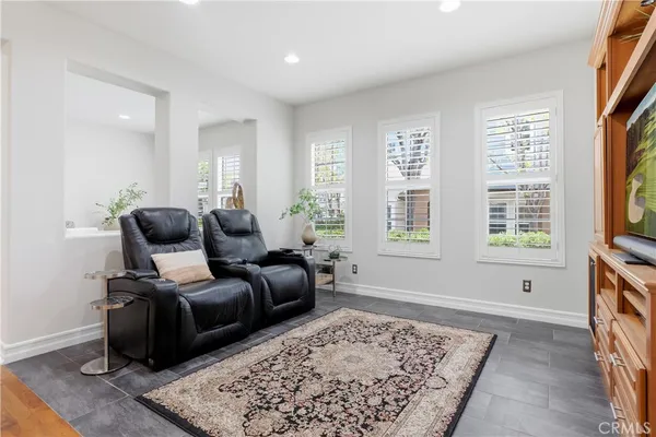 a workspace with furniture hardwood and a window
